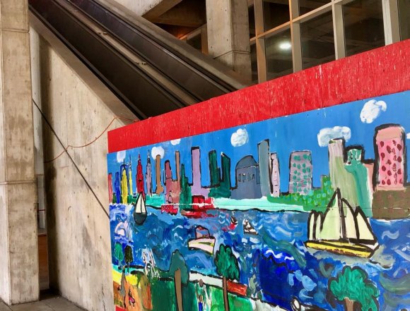 We can do better than this: RIOC's Disgraceful Neglect of Motorgate Public Space An escalator that once carried riders to the bridge to catch buses and cabs without adding to Main Street congestion is relegated to dust catcher.